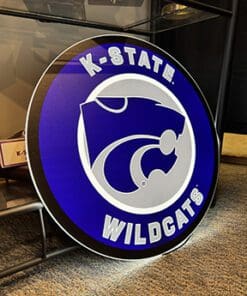 KSU LED wall sign top text reads "K-State" bottom text reads "Wildcats"